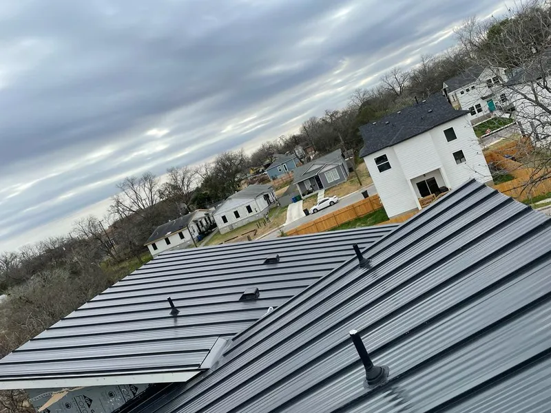 Standing seam metal roof panels with vents for Skylight Repair in Norfolk